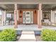Inviting front porch featuring comfortable seating, modern accents, and an appealing entrance at 1048 St Peter St, Indianapolis, IN 46203