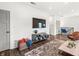 Modern living room featuring a mounted TV, stylish decor, and an open layout ideal for entertaining at 1048 St Peter St, Indianapolis, IN 46203