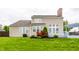View of a spacious backyard featuring a pristine lawn and well-maintained landscaping at 11674 Timken Ct, Fishers, IN 46037