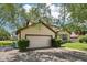 Attached two-car garage with ample parking space and convenient driveway access at 11733 East 21St St, Indianapolis, IN 46229