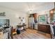 Efficient kitchen layout with stainless steel appliances and a view to the stairs at 11733 East 21St St, Indianapolis, IN 46229