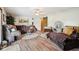 Spacious living room with wood floors and comfortable seating at 11733 East 21St St, Indianapolis, IN 46229