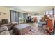 Spacious living room with comfortable seating, large windows, and stylish decor at 11733 East 21St St, Indianapolis, IN 46229