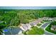 Picturesque aerial shot of a home nestled among lush greenery, offering a tranquil and private setting at 12258 Charing Cross Rd, Carmel, IN 46033