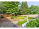 View from the backyard deck featuring green ground cover and wood fence at 12258 Charing Cross Rd, Carmel, IN 46033