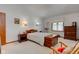 Bright bedroom showcases furniture, plush bed and a window at 12258 Charing Cross Rd, Carmel, IN 46033