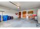 Garage interior featuring a white garage door and concrete floor at 12258 Charing Cross Rd, Carmel, IN 46033