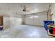 Garage interior featuring a white garage door and concrete floor at 12258 Charing Cross Rd, Carmel, IN 46033