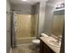 Bathroom features vanity with sink, toilet, and shower tub combo with shower curtain at 12301 Winding Creek Cir, Indianapolis, IN 46236