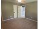 Neutral bedroom has carpeted floors and double door closet to maximize storage at 12301 Winding Creek Cir, Indianapolis, IN 46236