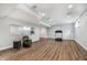 Finished basement with mirrors, drum set, and a treadmill at 12563 Sandstone Run, Carmel, IN 46033