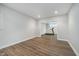Finished basement space with vinyl plank flooring and treadmill at 12563 Sandstone Run, Carmel, IN 46033