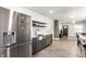 Contemporary kitchen with stainless steel appliances, open shelving, and a seamless design for a modern cooking experience at 1342 N Oakland Ave, Indianapolis, IN 46201