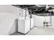 Functional laundry area with a modern washer and dryer setup, offering convenience and efficiency at 1342 N Oakland Ave, Indianapolis, IN 46201