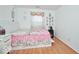 Bedroom showcasing a decorative window, bed, and personal touches at 1363 Briar Meadow Ct, Indianapolis, IN 46217