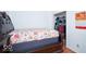 Bright bedroom view showcasing a comfortable bed, closet, and a calendar on the wall at 1363 Briar Meadow Ct, Indianapolis, IN 46217