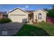Lovely single-story home with a brick and siding exterior, complemented by a well-manicured lawn at 1363 Briar Meadow Ct, Indianapolis, IN 46217