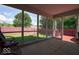 Enclosed sunroom with large windows offering natural light and views of the spacious, fenced-in backyard at 1363 Briar Meadow Ct, Indianapolis, IN 46217