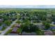 Picturesque aerial view of a quiet residential neighborhood, featuring lush green trees and well-maintained homes at 1416 Miami S Ct, Plainfield, IN 46168