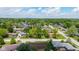 Picturesque aerial view of a quiet residential neighborhood, featuring lush green trees and well-maintained homes at 1416 Miami S Ct, Plainfield, IN 46168