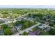 Picturesque aerial view of a quiet residential neighborhood, featuring lush green trees and well-maintained homes at 1416 Miami S Ct, Plainfield, IN 46168