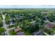 Picturesque aerial view of a quiet residential neighborhood, featuring lush green trees and well-maintained homes at 1416 Miami S Ct, Plainfield, IN 46168