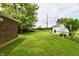 Spacious backyard with a well-maintained lawn and fencing at 1440 Brandt Dr, Indianapolis, IN 46241