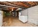 Unfinished basement with furnace, water heater and freezer at 1440 Brandt Dr, Indianapolis, IN 46241