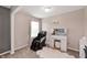 Cozy bedroom featuring a massage chair, vanity, and a plush rug at 15580 Garrano Ln, Fishers, IN 46040