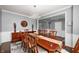 Spacious dining room with dark wood flooring and decorative wall accents at 15580 Garrano Ln, Fishers, IN 46040