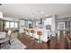 Spacious kitchen featuring a large island with seating, modern appliances, and ample counter space at 15580 Garrano Ln, Fishers, IN 46040