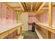 Unfinished basement with shelving, exposed ceilings, and ample storage space at 1649 Woodstock Dr, Brownsburg, IN 46112