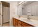 This bathroom features double sinks and a large mirror at 1649 Woodstock Dr, Brownsburg, IN 46112