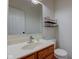 This half bathroom features a modern sink and faucet at 1649 Woodstock Dr, Brownsburg, IN 46112