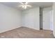 Bedroom featuring ceiling fan, closet, and neutral carpeting at 1649 Woodstock Dr, Brownsburg, IN 46112