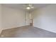 Spacious bedroom with neutral carpet, ceiling fan and bright light at 1649 Woodstock Dr, Brownsburg, IN 46112