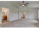 Spacious main bedroom with carpeting, and closets, and Primary bath at 1649 Woodstock Dr, Brownsburg, IN 46112