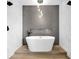 Contemporary bathroom with a soaking tub, a sleek design, and modern fixtures at 19 E Regent St, Indianapolis, IN 46225
