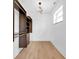 A large walk-in closet has hanging storage and is ready for organization at 19 E Regent St, Indianapolis, IN 46225