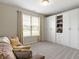 Inviting bedroom with a comfortable couch and built-in shelving for storage at 19657 Astoria Ave, Sheridan, IN 46069