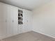 Bright bedroom featuring carpeted floors, a built-in closet, and ample natural light at 19657 Astoria Ave, Sheridan, IN 46069