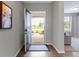 Inviting foyer with hardwood floors and a view of the front yard at 19657 Astoria Ave, Sheridan, IN 46069
