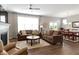 Bright living room with fireplace, comfortable seating, and dining area at 19657 Astoria Ave, Sheridan, IN 46069