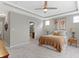 Serene main bedroom features a tray ceiling and adjoins to a private bath at 19657 Astoria Ave, Sheridan, IN 46069