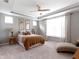 Relaxing main bedroom with tray ceiling, ceiling fan, and great natural light at 19657 Astoria Ave, Sheridan, IN 46069