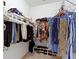 Walk-in closet with metal racks and shelving for ample storage of clothing, shoes, and accessories at 19657 Astoria Ave, Sheridan, IN 46069