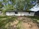 Back exterior view of a single story house at 2015 Rosewood Dr, Anderson, IN 46011