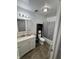 Standard bathroom features a shower/tub combo, toilet, and vanity with mirror providing essential functionality at 2015 Rosewood Dr, Anderson, IN 46011