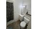 Functional bathroom with essential fixtures, neutral paint color, and a practical layout at 2015 Rosewood Dr, Anderson, IN 46011