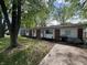 Charming single-story brick home with a well-maintained lawn and inviting front entrance at 2015 Rosewood Dr, Anderson, IN 46011